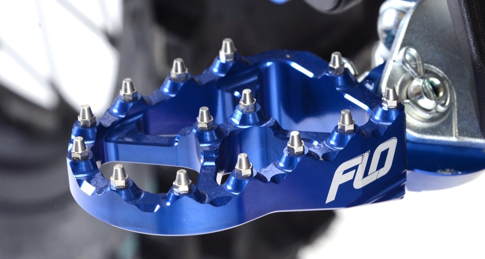 Husqvarna Foot Pegs – Flo Motorsports